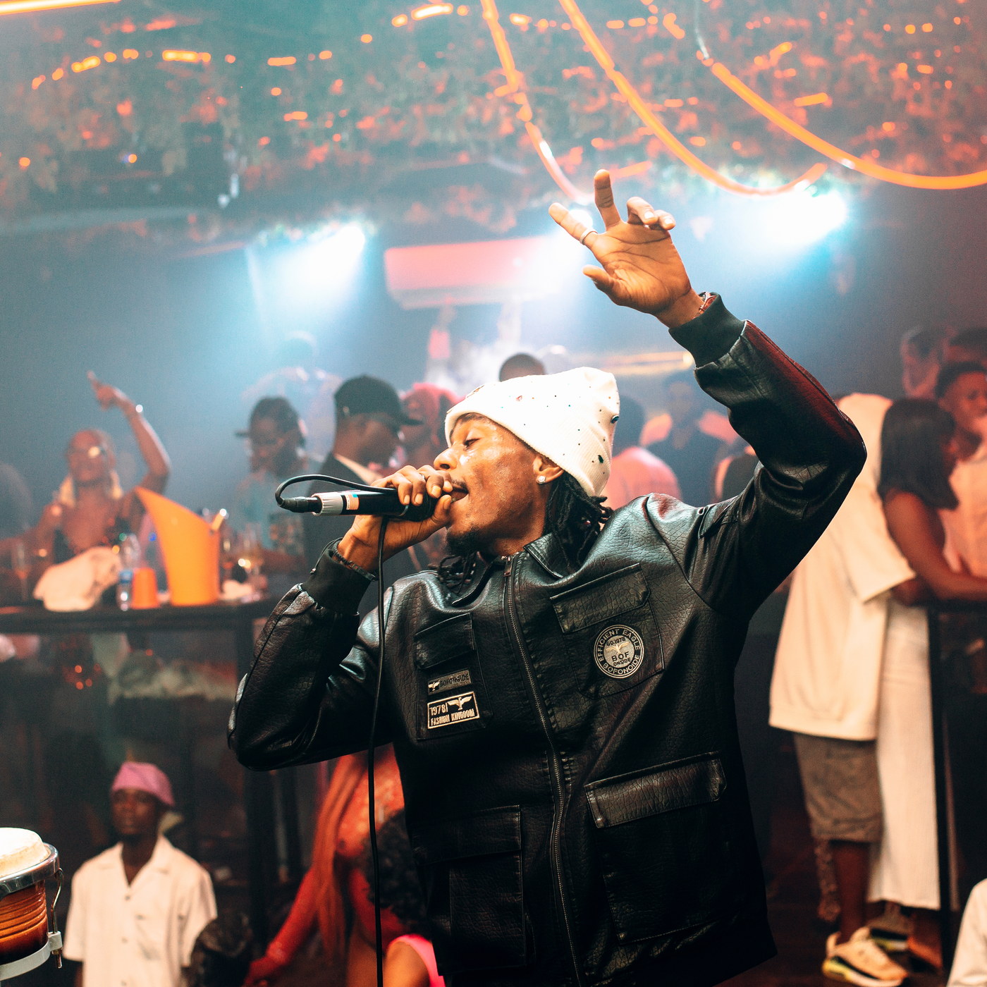 A performer singing to the room