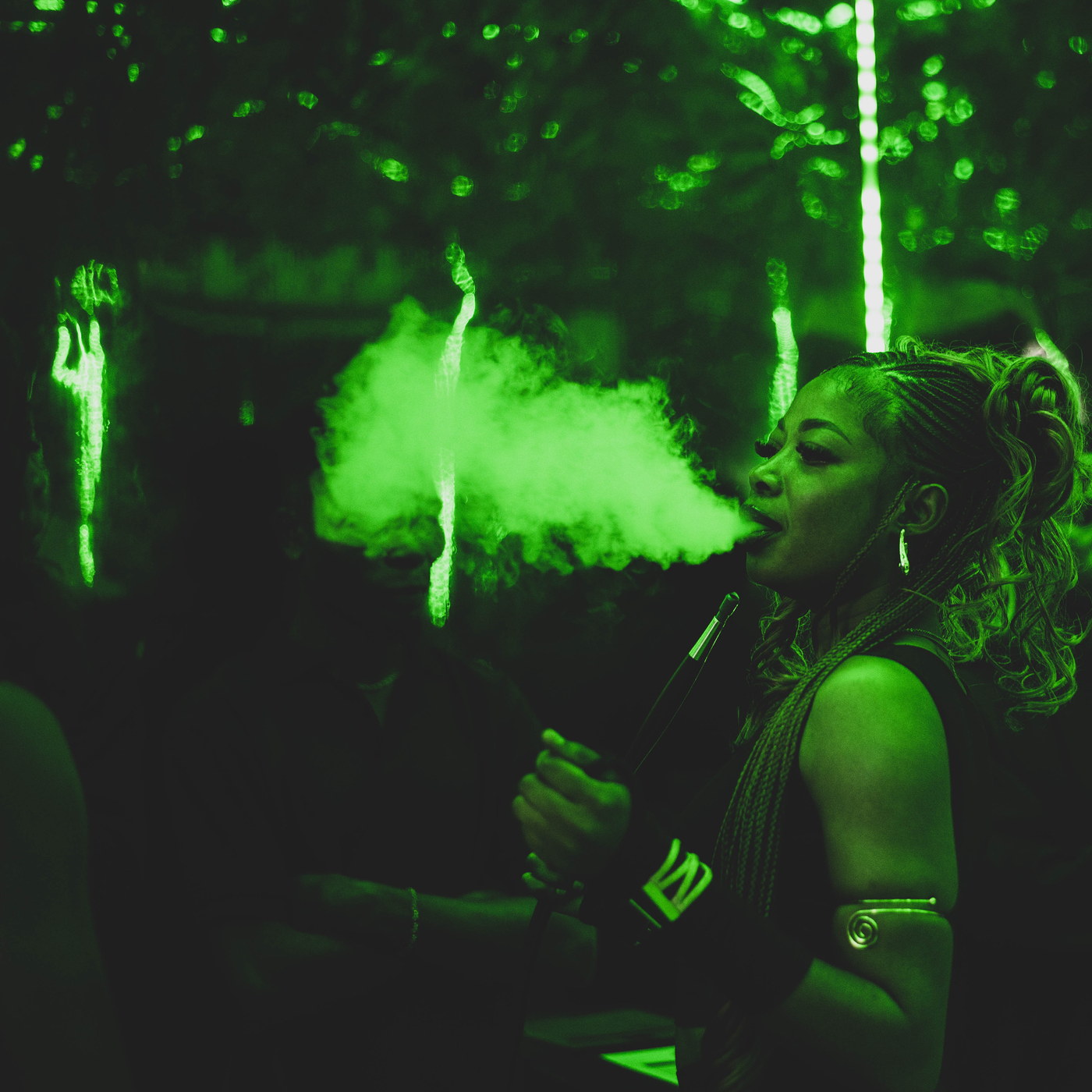 Shisha smoke under green light