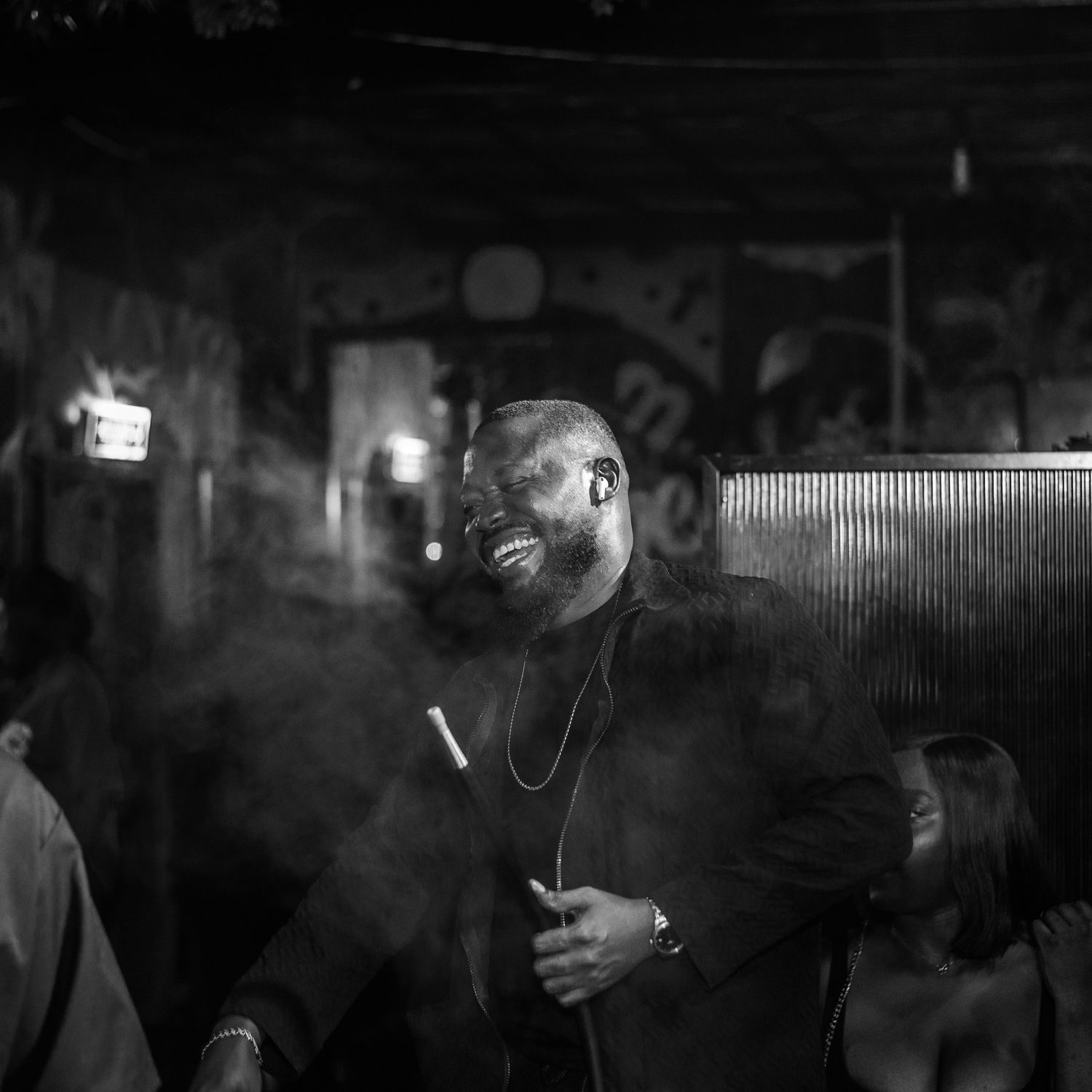 A guest laughing late in the night